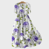 Zala | Maxikleid z rožami v sivki