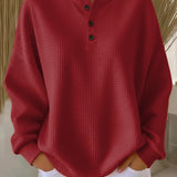 Metka | Henley-sweatshirt z vafljasto strukturo