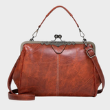 Mojca | Elegantna vintage torbica z brezčasnim šarmom